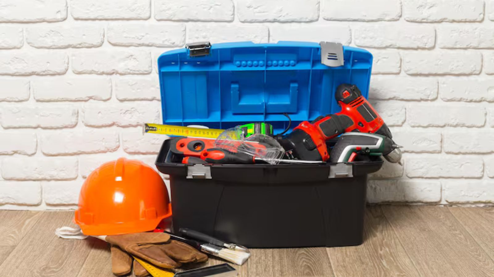 Plumber's tools laid out for a household repair
